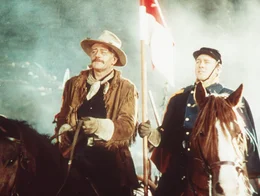 L-R: Capt. Nathan Cutting Brittles (John Wayne), Sgt. Tyree (Ben Johnson)