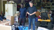 Kayland Brock and Matt Paxton sorting through items in client's hoarded garage in Oak Ridge Kayland Brock and Matt Paxton sorting through items in client's hoarded garage in Oak Ridge