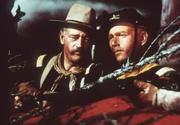 L-R: Capt. Nathan Cutting Brittles (John Wayne), 2nd Lt. Ross Pennell (Harry Carey Jr.)
