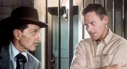 Anwalt McDonald (Kent Taylor, li.) hat keine guten Nachrichten f&uuml;r seinen Sch&uuml;tzling: Pete Stone (John Agar, re.) wurde f&uuml;r schuldig befunden ...