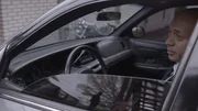 Demery (John Nicholson) is in his vehicle. Demery (John Nicholson) is in his vehicle.