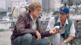 CIA-Agent Nathan (Robert Redford, l.) bildet in Vietnam seinen Sch&uuml;tzling Tom Bishop (Brad Pitt) aus.