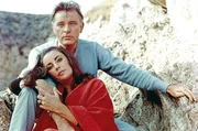 Elizabeth Taylor und Richard Burton am Set der Dreharbeiten zu &bdquo;&hellip; die alles begehren&ldquo; im Jahr 1965: Die von der Welt viel beachtete Liebe der beiden mit all ihren H&ouml;hen und Tiefen dauerte bis zu Burtons Tod 1984.