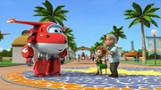 Jett bringt Julia und ihrem Großvater den Schlüssel für die riesigen Dino-Roboter, die neue Attraktion im Vergnügungspark. Jett bringt Julia und ihrem Großvater den Schlüssel für die riesigen Dino-Roboter, die neue Attraktion im Vergnügungspark.