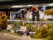 Wolfgang and Lars repair the tracks on a bridge in the Northeast Sea, which is filled with 30,000 liters of water.