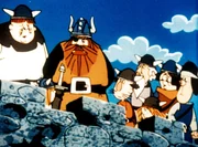 Die Wikinger beobachten, wie Baltac&rsquo;s Strohmann verbrennt. Langsam zieht auf ihren Gesichtern Siegesfreude auf, der Kampf hat sich zu ihren Gunsten entschieden.