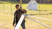 Construction photo of Jonathan Knight working on the barn, as seen on Farmhouse Fixer, Season 3.