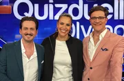 Moderatorin Esther Sedlaczek (M.) mit den Kandidaten des Teams „Bühne“: Marti Fischer (l.) und Bodo Wartke (r.). Moderatorin Esther Sedlaczek (M.) mit den Kandidaten des Teams „Bühne“: Marti Fischer (l.) und Bodo Wartke (r.).