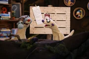 Jan und Henry untersuchen eine warme Mütze. Jan und Henry untersuchen eine warme Mütze.