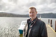 Michael Croghan ist Fährmann auf dem Lake St. Clair. Hier endet einer der berühmtesten Fernwanderwege Australiens – der Overland Track. Michael Croghan ist Fährmann auf dem Lake St. Clair. Hier endet einer der berühmtesten Fernwanderwege Australiens – der Overland Track.