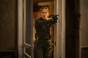 Agent Sylvia Washington (Jenna Elfman)