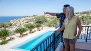 Theresa Hernandez (R) and her husband Lazaro Hernandez (L) pointing at the sea view from one of the houses they view during their house hunt in Crete, Greece, as seen on Mediterranean Life Theresa Hernandez (R) and her husband Lazaro Hernandez (L) pointing at the sea view from one of the houses they view during their house hunt in Crete, Greece, as seen on Mediterranean Life