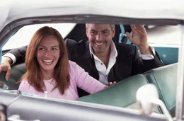 Tess Ocean (Julia Roberts), Danny Ocean (George Clooney)