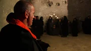 Terry walking into a gathering of warrior monks. Terry walking into a gathering of warrior monks.