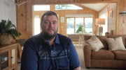 Contributor Jayson Rumball, former employee of Kevin Boyd Sr. looking at camera during his interview. Tattoo visible on his lower right arm. Interior, landscape Contributor Jayson Rumball, former employee of Kevin Boyd Sr. looking at camera during his interview. Tattoo visible on his lower right arm. Interior, landscape