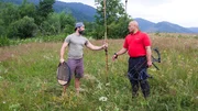 Jake and Matt standing in a field enjoying a little target practice. Jake and Matt standing in a field enjoying a little target practice.