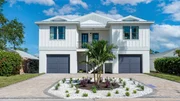 The exterior of the Walsh's modular home after reveal, as seen on 100 Day Dream Home, Season 6. The exterior of the Walsh's modular home after reveal, as seen on 100 Day Dream Home, Season 6.
