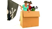 Tanja, André und Knolle in ihrem selbstgebauten Piratenboot. Harr! Tanja, André und Knolle in ihrem selbstgebauten Piratenboot. Harr!