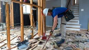 Bernadine's wood floors were damaged by water leakage from the leaking roof done by a previous conractor Bernadine's wood floors were damaged by water leakage from the leaking roof done by a previous conractor