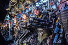 Major Bill Cage (Tom Cruise).