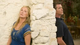 L-R: Donna (Meryl Streep), Sam Carmichael (Pierce Brosnan).