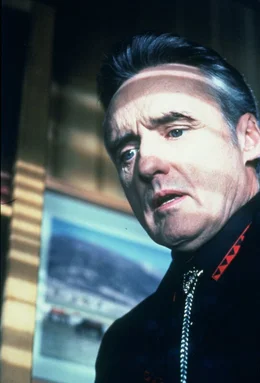 Der betrogene Killer Lyle (Dennis Hopper) macht sich auf die Suche nach dem fl&uuml;chtigen Michael ...