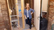 A construction photo of Kristina Crestin in the bathroom, as seen on Farmhouse Fixer, Season 3.