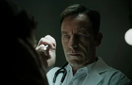 Volmer (Jason Isaacs)