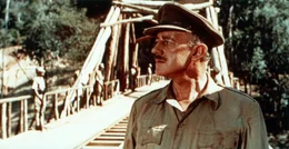 Alec Guinness as Colonel Nicholson