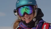 A woman who skis.