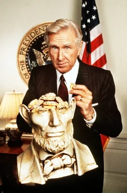 Der frisch gebackene Pr&auml;sident Tug Benson (Lloyd Bridges) bei einer seiner seltsamen Riten ...