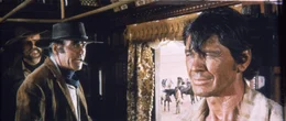 Der geheimnisvolle Mundharmonikaspieler (Charles Bronson, r.) und der eiskalte Killer Frank (Henry Fonda, M.) sind nicht gerade die besten Freunde ...