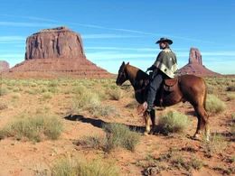Joe Dimmick als Clint Eastwood Darsteller in Monument Valley.