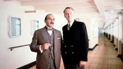Hercule Poirot (David Suchet) und Captain Hastings (Hugh Fraser) in der Episode "Die Reise auf der Queen Mary". Hercule Poirot (David Suchet) und Captain Hastings (Hugh Fraser) in der Episode "Die Reise auf der Queen Mary".
