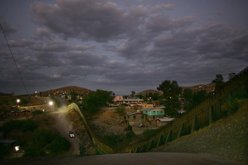 NOGALES, AZ :  The U.S. border Patrol drives along the U.S. Mexican border June 16, 2006 in Nogales, Arizona.