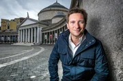 Picture Shows: Dr Michael Scott in the Piazza del Plebiscito, about to explore Naples?s underground spaces directly beneath his feet.