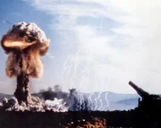 Operation Upshot-Knothole Grable, with mushroom cloud from the only U.S. nuclear shell ever fired by the M65 Atomic Annie "atomic cannon" (lower right).