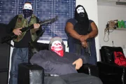 New Orleans, LA, USA: Trafficker Escobar with 2 crew members and weapons.