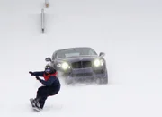 Auto vs. Snowboarder