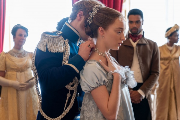 BRIDGERTON (L to R) FREDDIE STROMA as PRINCE FRIEDERICH, PHOEBE DYNEVOR as DAPHNE BRIDGERTON and REGÉ-JEAN PAGE as SIMON BASSET in episode 104 of BRIDGERTON Cr. LIAM DANIEL/NETFLIX © 2020