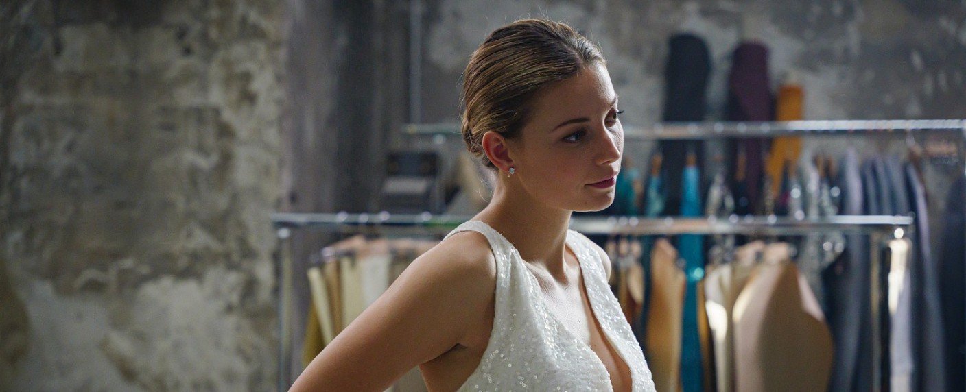 Modeerbin in Dreiecksgeschichte zwischen Macht und Gewalt