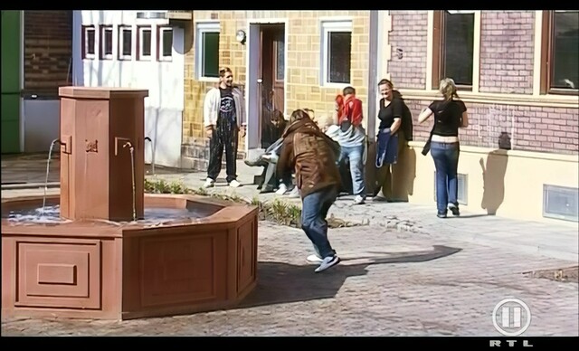 Die Dorfbewohner auf dem Marktplatz