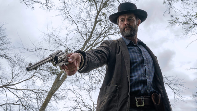 John Dorie (Garret Dillahunt)